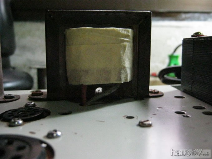 烟罐作牛罩变压器罩,废物利用,绿色环保.