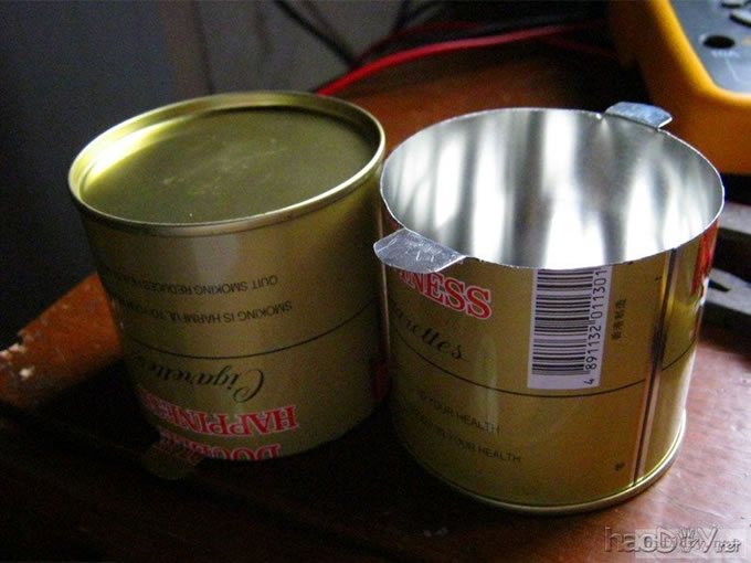 烟罐作牛罩变压器罩,废物利用,绿色环保.