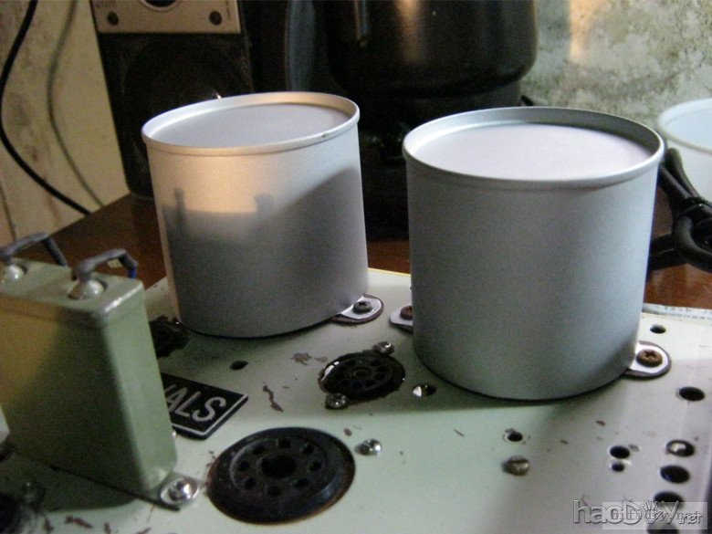 烟罐作牛罩变压器罩,废物利用,绿色环保.