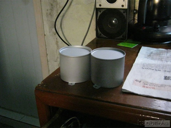 烟罐作牛罩变压器罩,废物利用,绿色环保.