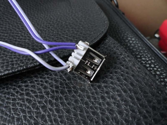 点击检查原图 节能环保无处不在,自制太阳能充电包包