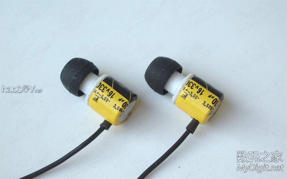 拆一支牙刷和两个电容,然后DIY做成一副耳机,呵呵...