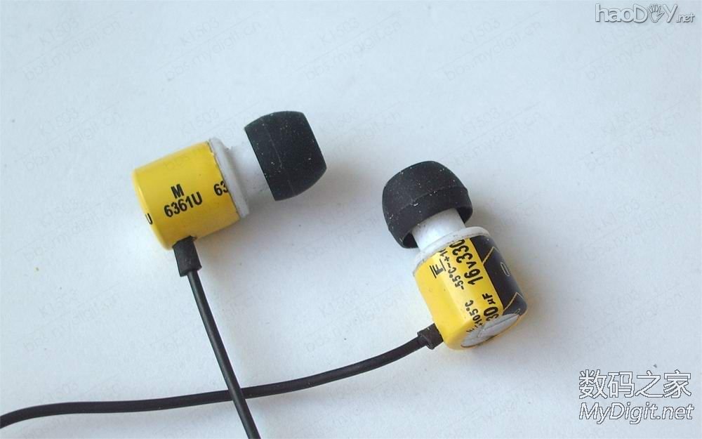 拆一支牙刷和两个电容,然后DIY做成一副耳机,呵呵...